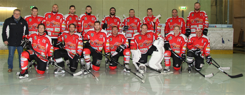 Eine Gruppe von Hockeyspielern posiert für ein Foto